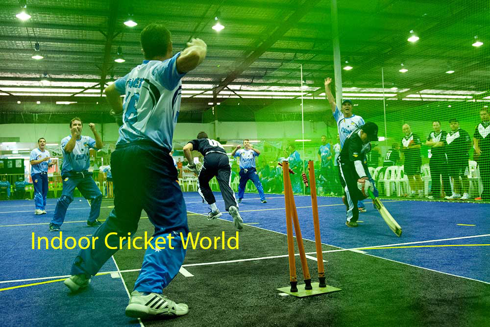 Indoor Cricket Wicket Keeper about to throw to far end, with both batsmen well out of their creases. Typical scenario on "third ball" call.